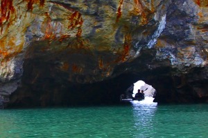 Sea kayaking through caves